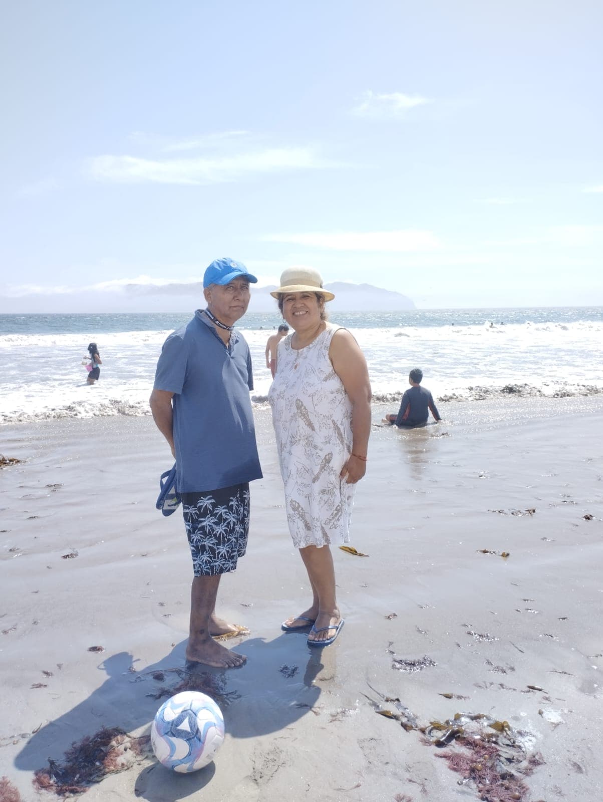 Con su esposa en la playa