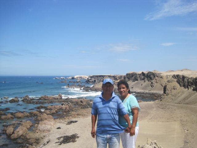 Con su esposa en la playa